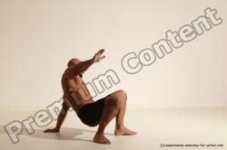 Underwear Gymnastic poses Man Black Muscular Bald Dancing Dynamic poses Academic